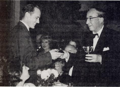 David Millett (on the left) receives a gliding trophy in 1959